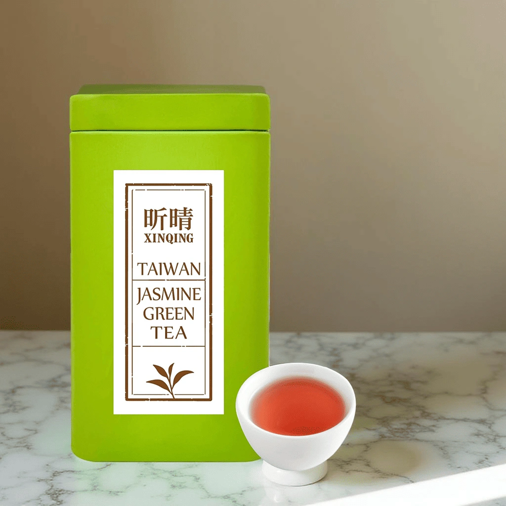 Xin Qing Taiwan Jasmine Green Tea tin with ceramic cup on marble table